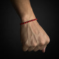 Pulsera roja con negro