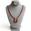 Collar niño de atocha